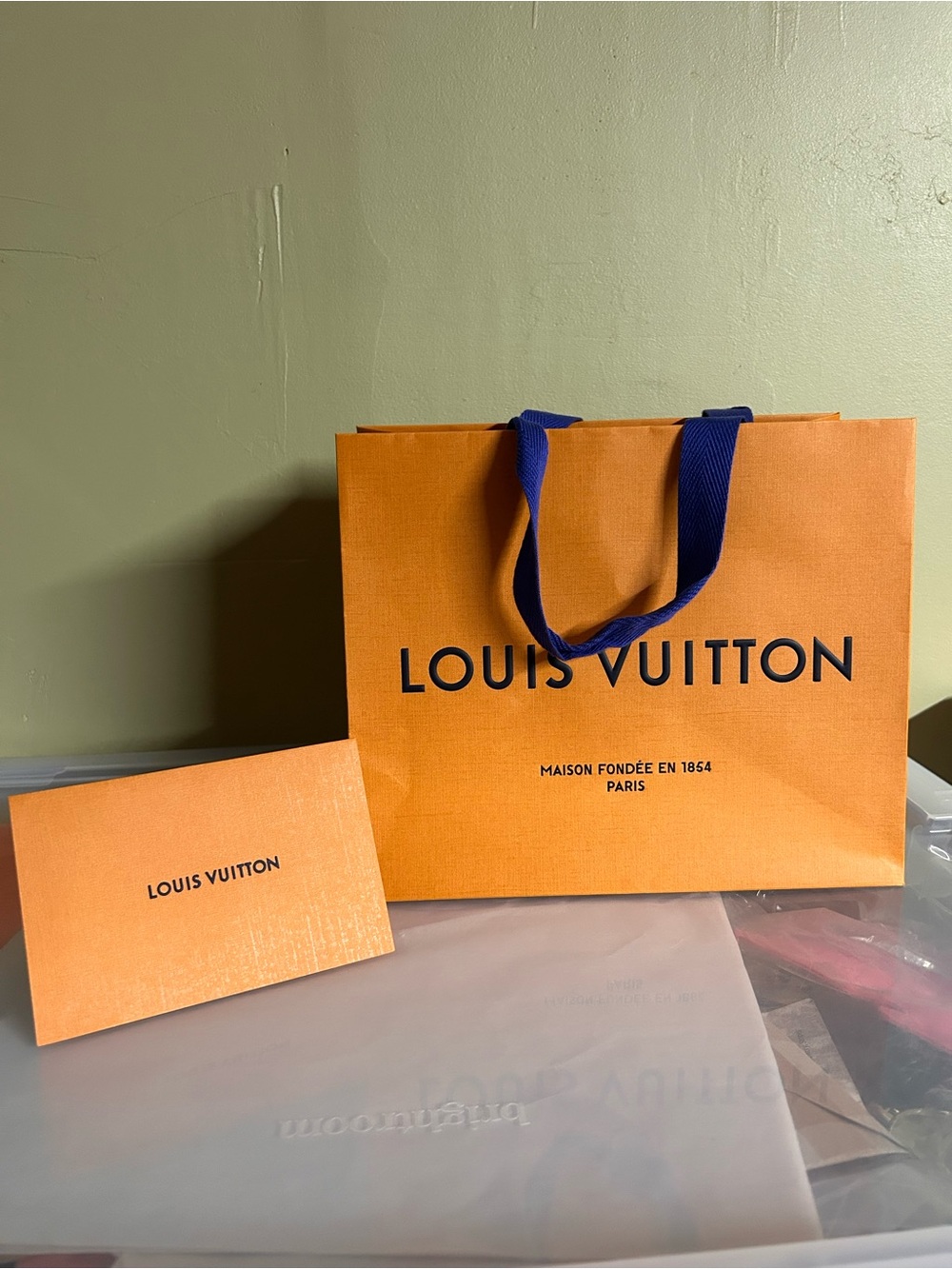 Louis Vuitton Orange Shopping Bag with Blue Ribbon Handles
